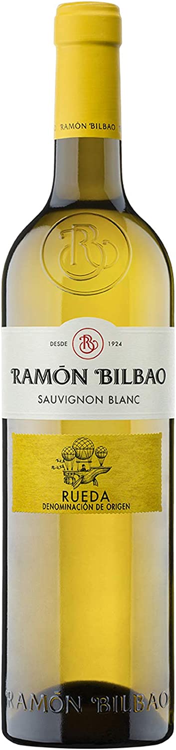 Quesos y vino blanco