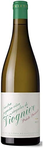 Quesos y vino blanco